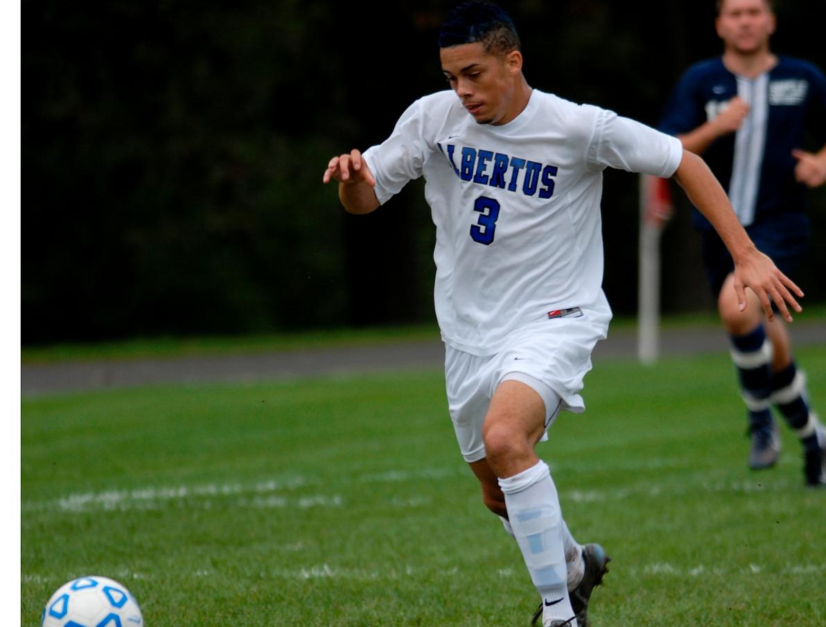 Falcons Cruise to 4-0 Win Over Regis in Home Opener