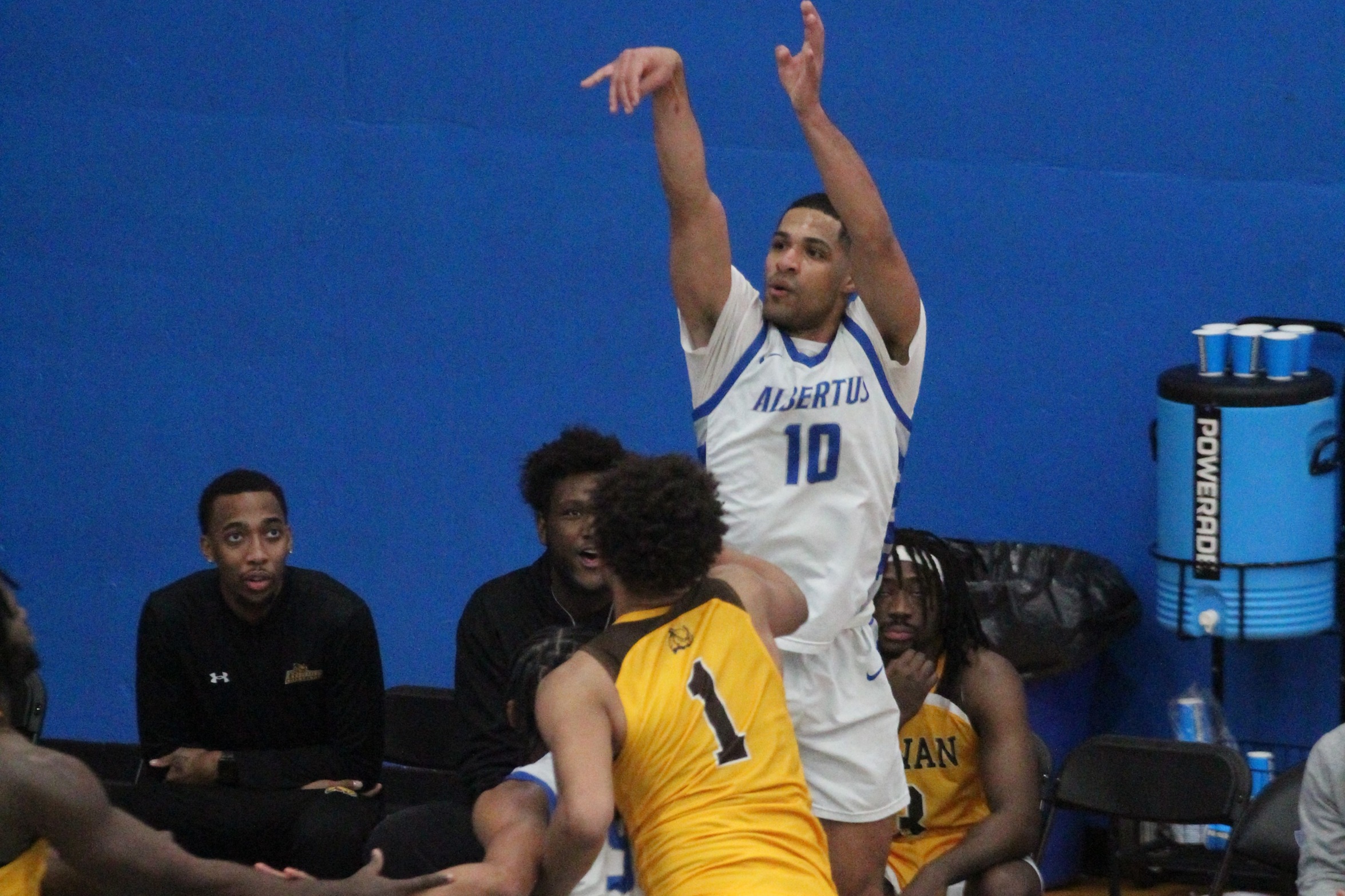 Men's Basketball Edged By Rowan