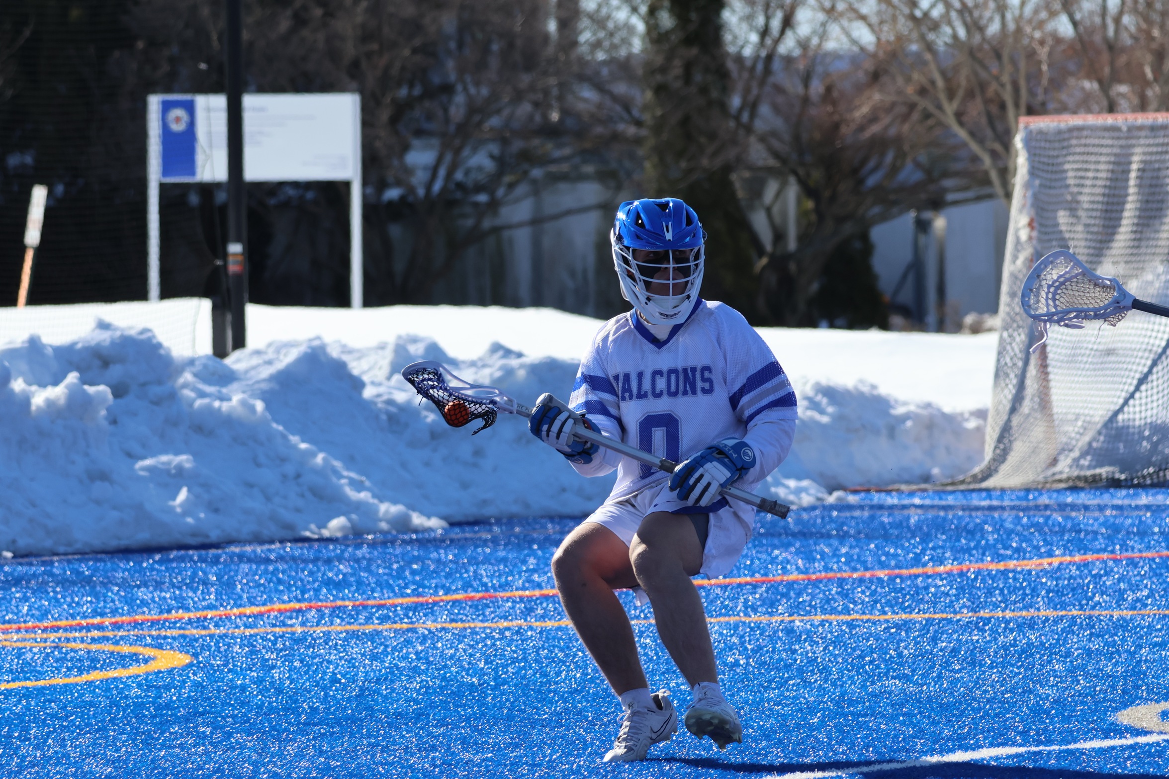 Strecker Scores Four Goals, But Men's Lacrosse Loses To Regis In GNAC Opener