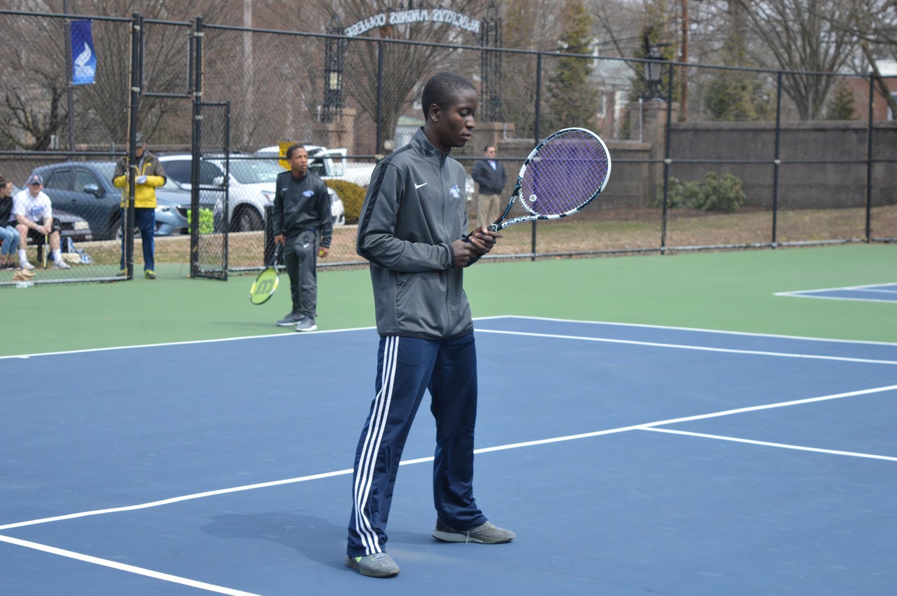 Men's Tennis Edged by Suffolk, 6-3