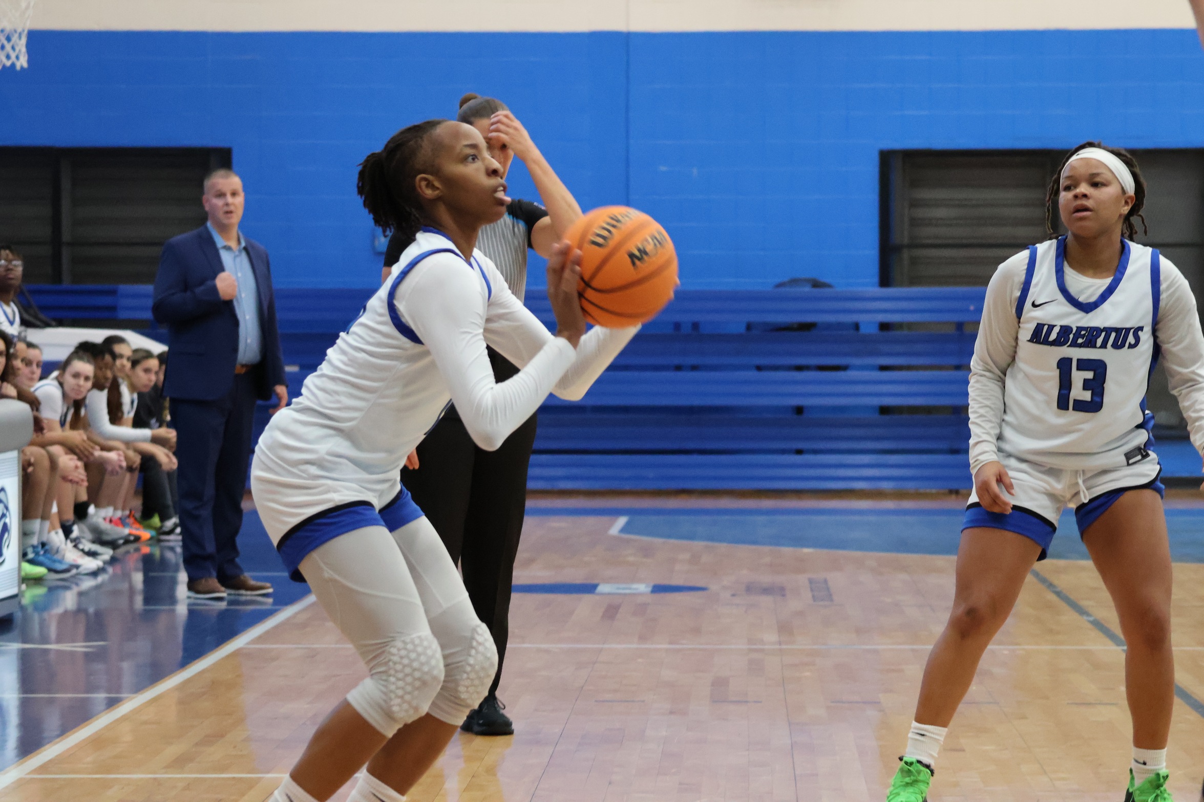 Zdru Hits Late Three, Murray-Leach Sets Block Record As Women's Basketball Rallies Past JWU